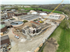 Aerial view of wastewater treatment facility foundation in progress
