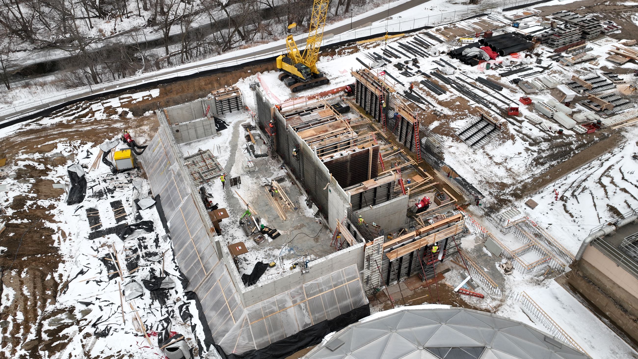 Aerial of wastewater treatment building construction in progress